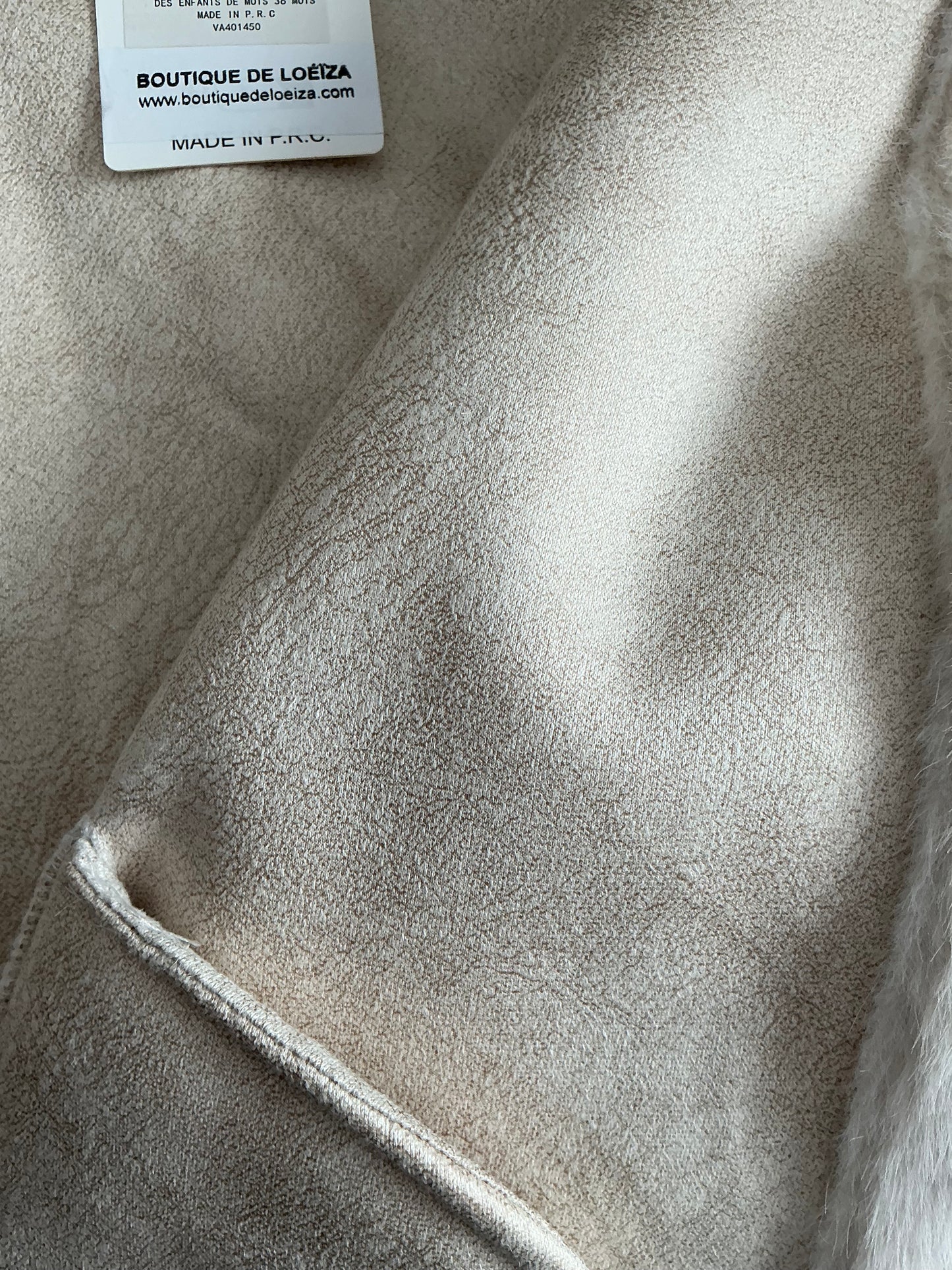 Veste fourrure à capuche